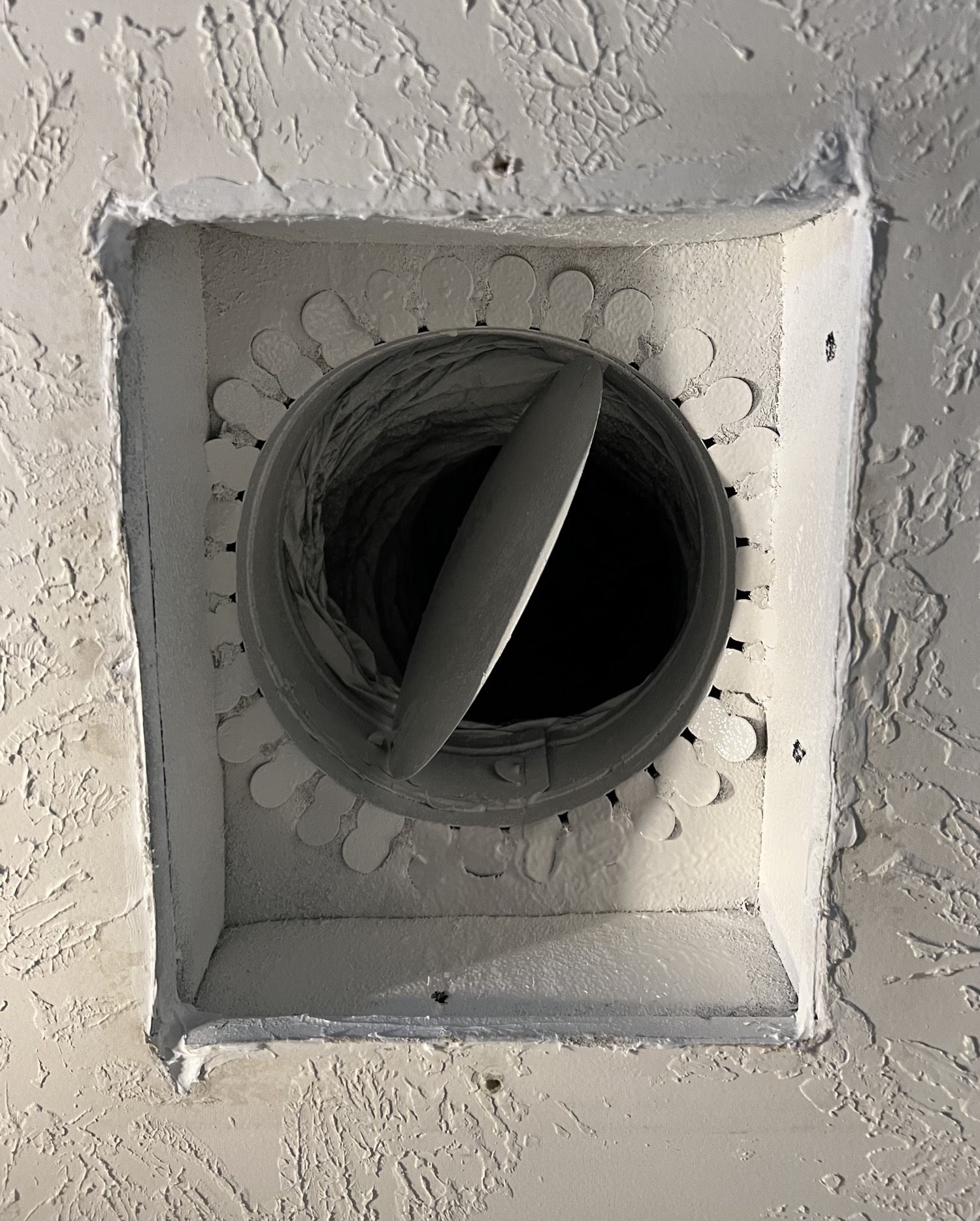 Clean ceiling vent boot after professional air duct cleaning in Sugar Land